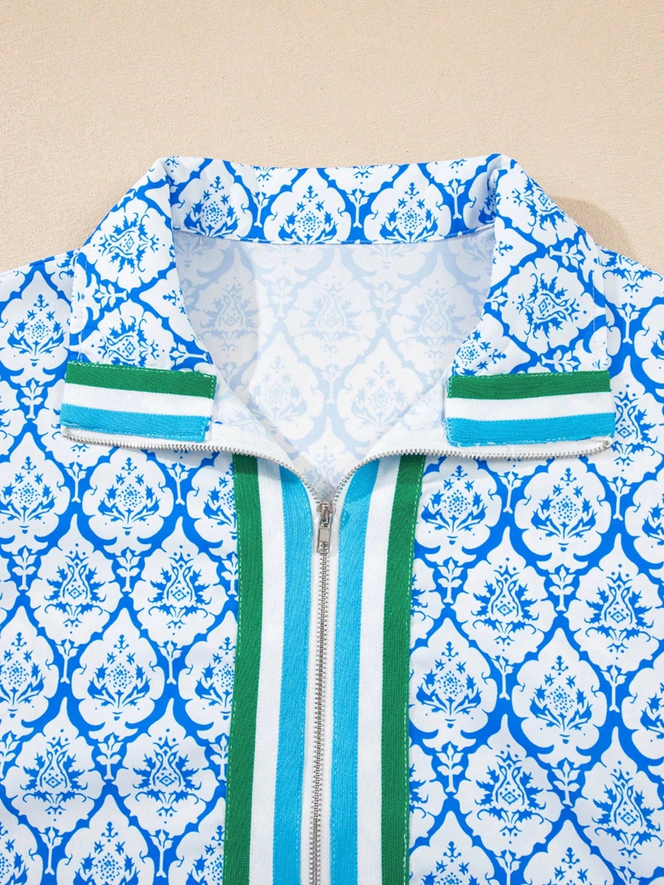 Acelitt Sky Blue Western Print Zip Collar Short Sleeve Top For Women, Summer