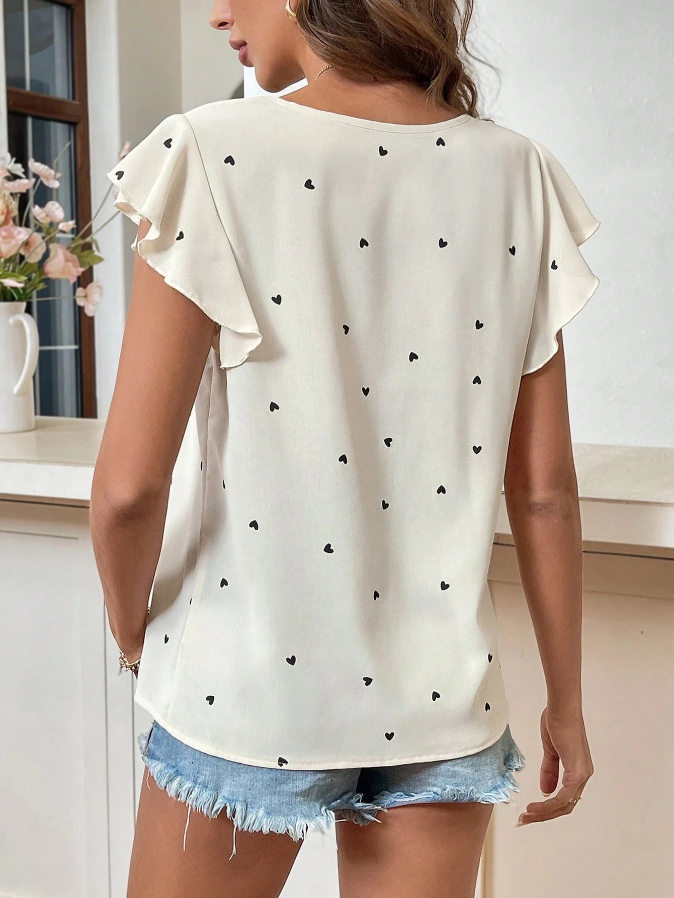 Easowa Boho Elegant Women Clothing Summer Floral Shadow Print Ruffle Hem Round Neck Blouse For Women Brunch Black And White