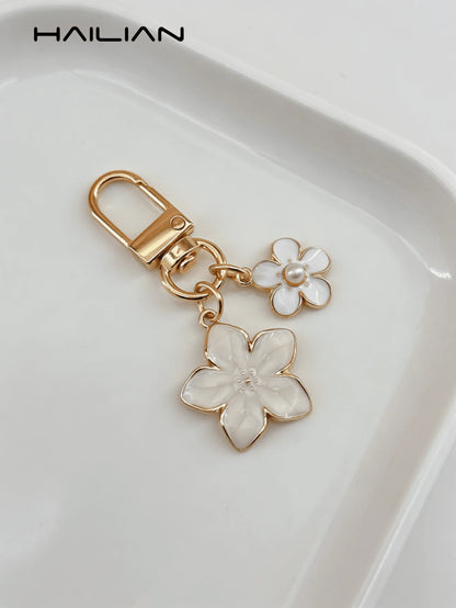 HAILIAN 1pc Sakura Shaped Keychain, Lightweight And Graceful Sakura Design With Rectangular Tag, Suitable For Bag Pendant, Car Key Chain, Couples, Birthday, Holiday Gifts Bag Charm Accessories Charms