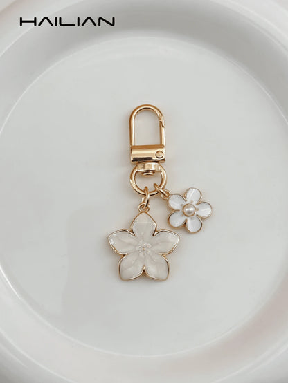HAILIAN 1pc Sakura Shaped Keychain, Lightweight And Graceful Sakura Design With Rectangular Tag, Suitable For Bag Pendant, Car Key Chain, Couples, Birthday, Holiday Gifts Bag Charm Accessories Charms