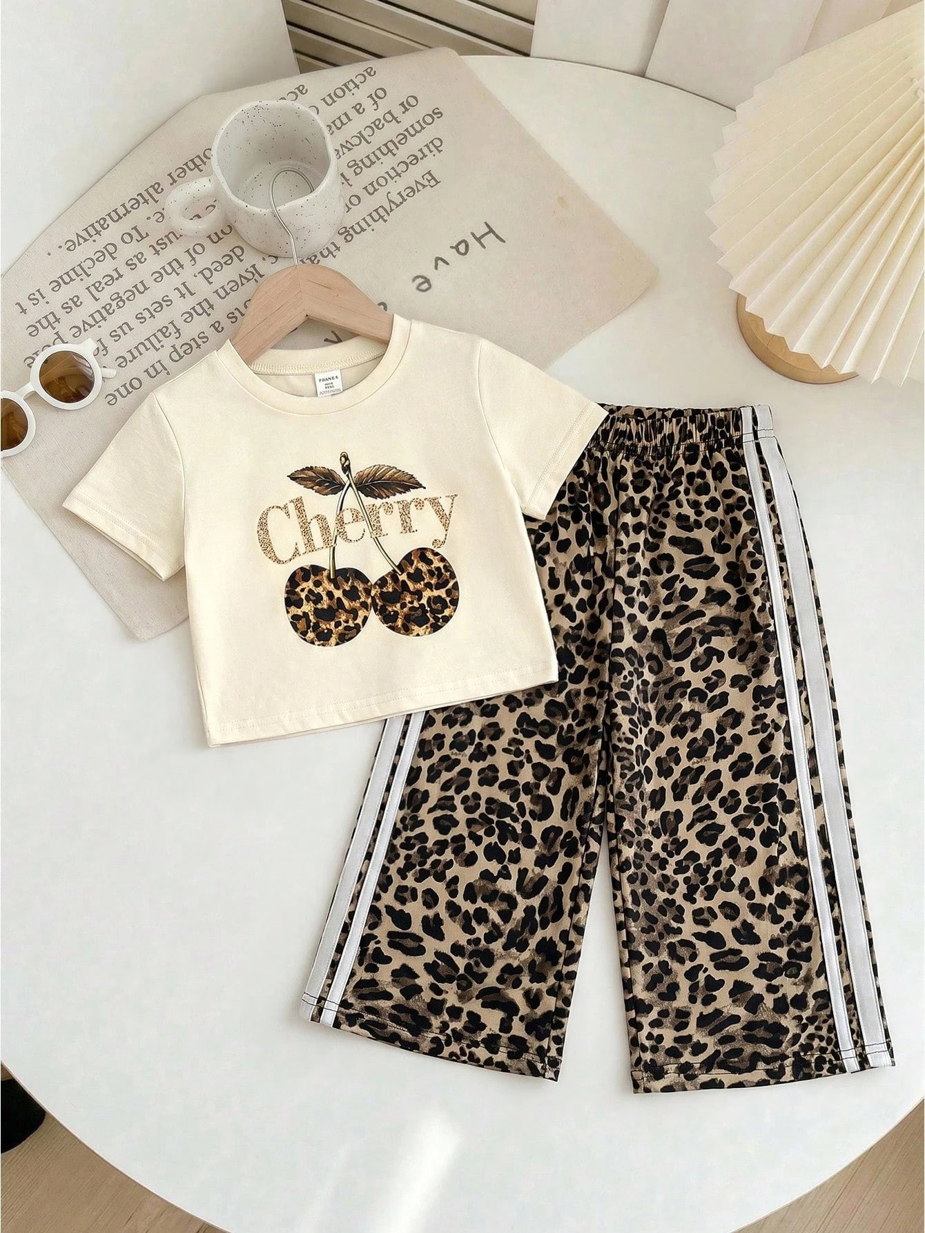 LMoss Kids Baby Girl Knit Solid Color Leopard Print Cherry Pattern Crew Neck T-Shirt And Woven Loose Leopard Print Long Pants 2-Piece Set