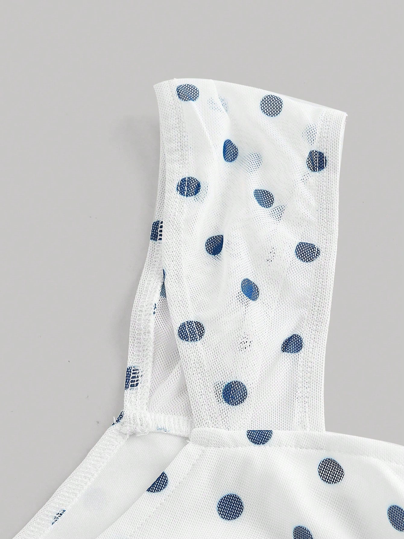 MOD Asymmetric Bow Ruched Mesh Polka Dot Top