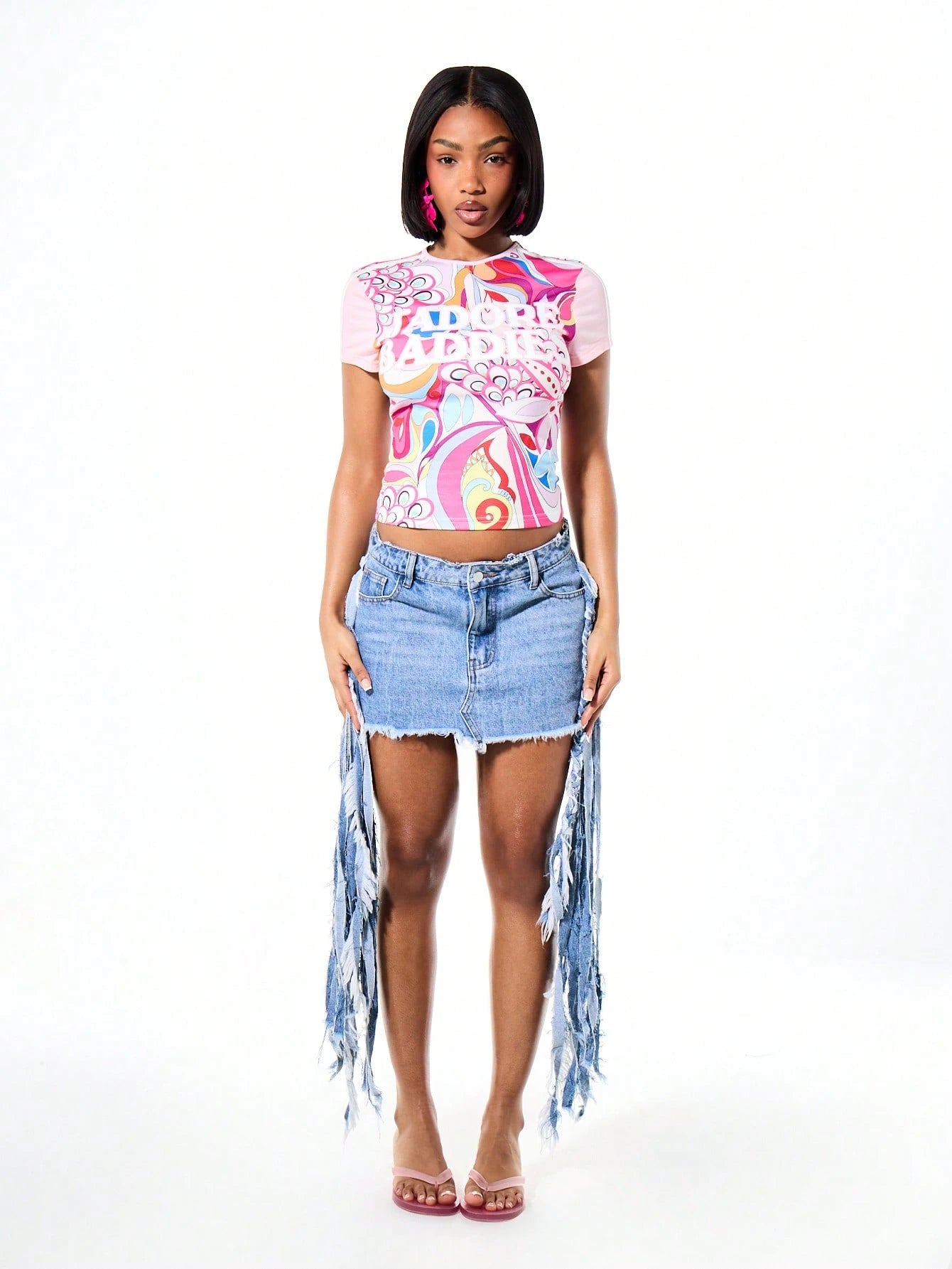 SUMWON WOMEN Women's Vibrant Printed Short Sleeve Crew Neck Baby Tee With Abstract Swirl Pattern And Mixed Graphic Text Design