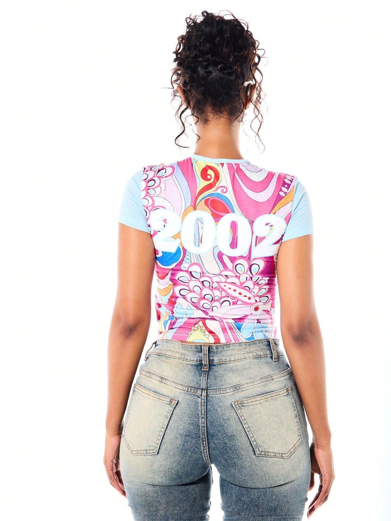 SUMWON WOMEN Women's Vibrant Printed Short Sleeve Crew Neck Baby Tee With Abstract Swirl Pattern And Mixed Graphic Text Design