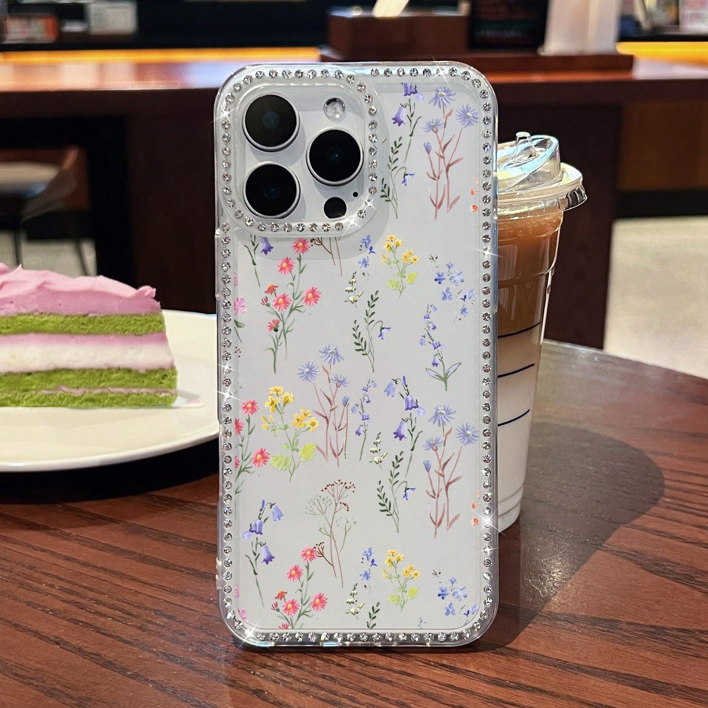 What Floral Print Mobile Phone Case Designed With Colorful Flowers And Delicate Leaves Suitable For IPhone 16 15 14 13 12 And 11 Pro Models Made Of TPU Material And Provides Shockproof Protection