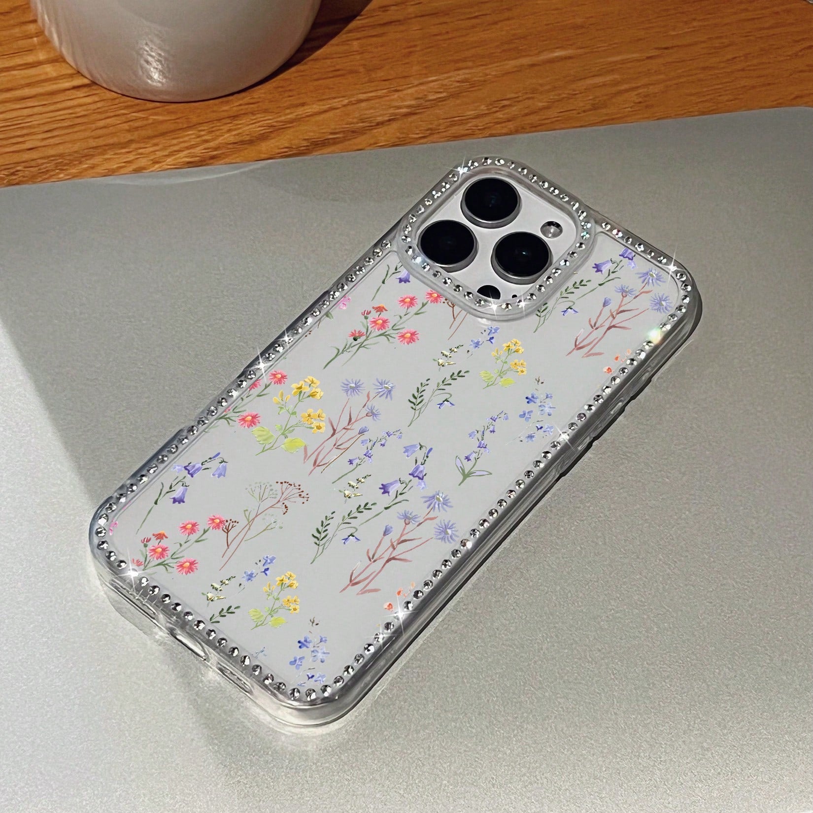 What Floral Print Mobile Phone Case Designed With Colorful Flowers And Delicate Leaves Suitable For IPhone 16 15 14 13 12 And 11 Pro Models Made Of TPU Material And Provides Shockproof Protection