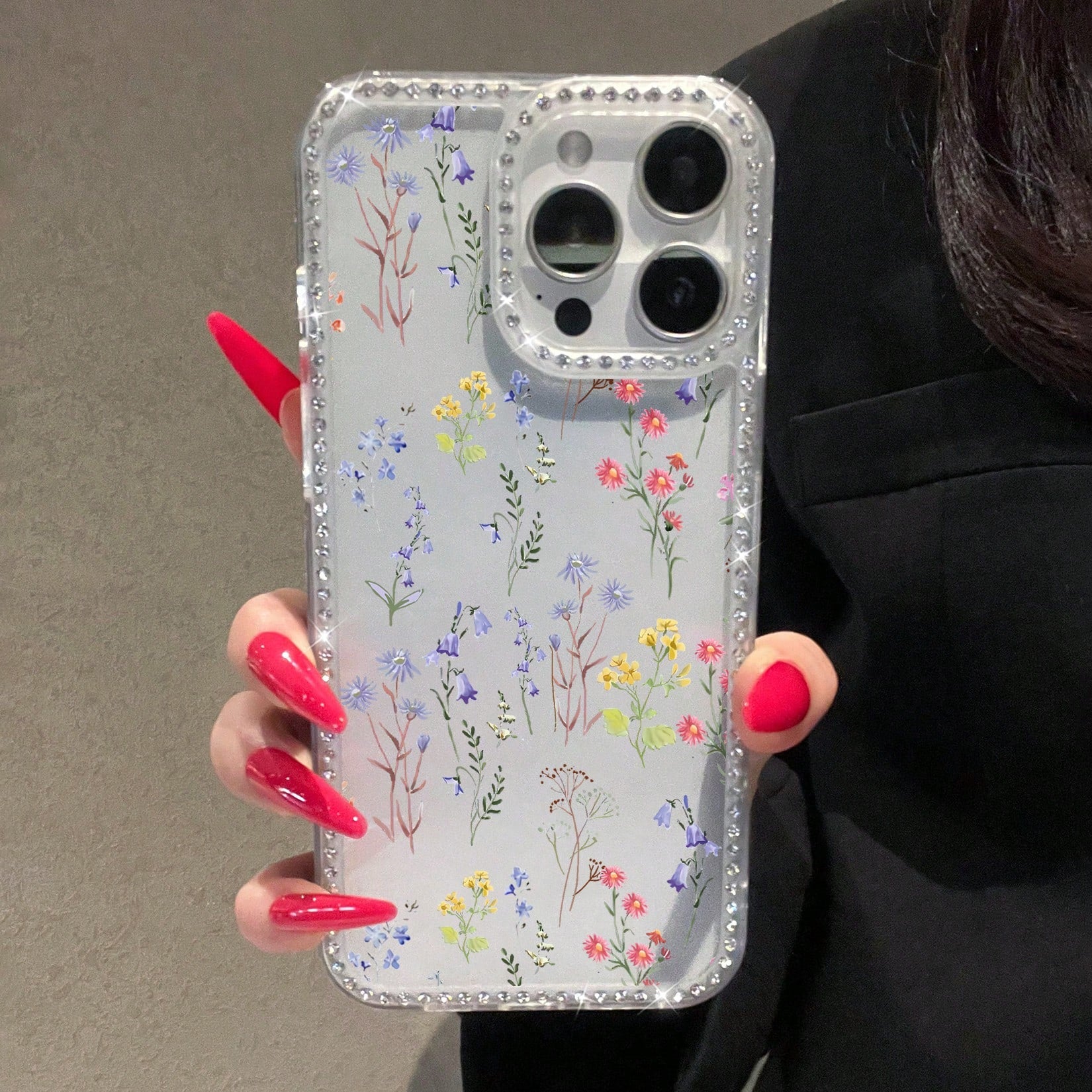 What Floral Print Mobile Phone Case Designed With Colorful Flowers And Delicate Leaves Suitable For IPhone 16 15 14 13 12 And 11 Pro Models Made Of TPU Material And Provides Shockproof Protection